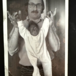 Bill Tatton and his adopted orangutan. 